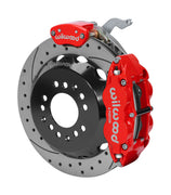 Wilwood C4 Corvette rear MC4 assembly showing the red Superlite 4R service caliper and separate MC4 parking caliper around a 12.88-inch drilled-and-slotted rotor