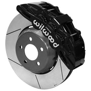 Wilwood Mustang or Ridetech hub-spindle 14-inch front assembly with a black SX6R caliper beside a 14.00-inch GT-slotted rotor and its mounting hat