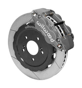Wilwood S2000 front race assembly with a gray anodized Forged Superlite 6R caliper beside a 12.88-inch GT-slotted rotor and its mounting hat