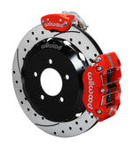Wilwood NC MX-5 Miata rear MC4 assembly showing the red Narrow Dynapro Radial service caliper and separate MC4 parking caliper around a 12.88-inch drilled-and-slotted rotor