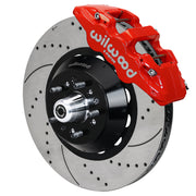 Wilwood GM/Ridetech pin-spindle AERO6 front assembly with a red AERO6 caliper, 15.00-inch drilled-and-slotted rotor and central wheel hub with studs