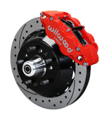 Wilwood 5x5 ProSpindle 12.88-inch front assembly with a red Superlite 6R caliper, 12.88-inch drilled-and-slotted rotor and central wheel hub with studs