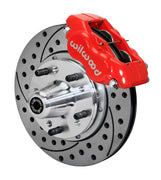 Wilwood C-body 11-inch Dynalite front assembly with a red Forged Dynalite Internal caliper, 11.00-inch drilled-and-slotted rotor and central wheel hub with studs