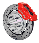 Wilwood C-body 12.19-inch Dynalite front assembly with a red Forged Dynalite Internal caliper, 12.19-inch drilled-and-slotted rotor and central wheel hub with studs