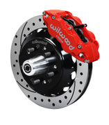 Wilwood C-body 12.88-inch Superlite front assembly with a red Superlite 6R caliper, 12.88-inch drilled-and-slotted rotor and central wheel hub with studs