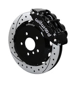 Wilwood five-lug Mini front assembly with a black Superlite 6R caliper beside a 12.88-inch drilled-and-slotted rotor and its mounting hat