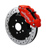 Wilwood five-lug Mini front assembly with a red Superlite 6R caliper beside a 12.88-inch drilled-and-slotted rotor and its mounting hat