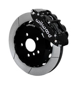 Wilwood five-lug Mini front assembly with a black Superlite 6R caliper beside a 12.88-inch GT-slotted rotor and its mounting hat