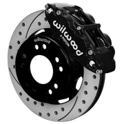 Wilwood C10 modular Pro Drop 12.19-inch front assembly with a black Superlite 6R caliper beside a 12.19-inch drilled-and-slotted rotor and its mounting hat