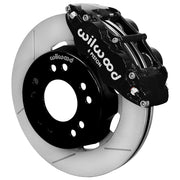 Wilwood C10 modular Pro Drop 12.19-inch front assembly with a black Superlite 6R caliper beside a 12.19-inch GT-slotted rotor and its mounting hat