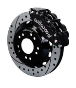 Wilwood C10 modular Pro Drop 13.06-inch front assembly with a black Superlite 6R caliper beside a 13.06-inch drilled-and-slotted rotor and its mounting hat