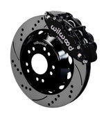 Wilwood C10 modular Pro Drop Superlite 14-inch front assembly with a black Superlite 6R caliper beside a 14.00-inch drilled-and-slotted rotor and its mounting hat
