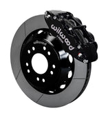 Wilwood C10 modular Pro Drop Superlite 14-inch front assembly with a black Superlite 6R caliper beside a 14.00-inch GT-slotted rotor and its mounting hat