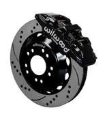 Wilwood C10 modular Pro Drop AERO6 front assembly with a black AERO6 caliper beside a 14.00-inch drilled-and-slotted rotor and its mounting hat