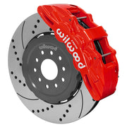Wilwood Corvette/XLR or Ridetech hub-spindle 15-inch front assembly with a red SX6R caliper beside a 15.00-inch drilled-and-slotted rotor and its mounting hat