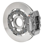Wilwood gray inboard sprint caliper beside the assembled 12.19-inch plain-face vented iron rotor and splined center clamp
