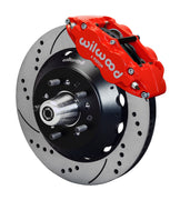 Wilwood red six-piston front caliper beside a 14-inch drilled-and-slotted rotor, separate hat and projecting hub for the early Ford V8 spindle installation