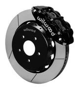 Wilwood black dust-sealed Superlite 6R caliper over an assembled 14-inch slotted rotor and separate hat for the Pontiac GTO front installation