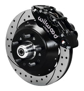Wilwood black six-piston front caliper beside a 14-inch drilled-and-slotted rotor, separate hat and projecting hub for the GM/Ridetech pin-spindle front installation