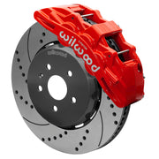 Wilwood red SX6R caliper over an assembled 15-inch drilled-and-slotted dynamic lug-drive disc and hat for the fifth-generation Camaro 15-inch front arrangement