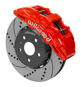 Wilwood red SX6R caliper over an assembled 14-inch drilled-and-slotted dynamic lug-drive disc and hat for the sixth-generation Camaro 14-inch front arrangement