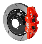 Wilwood red AERO6 caliper over an assembled 14-inch slotted rotor and separate hat for the Superformance GT40 rear installation