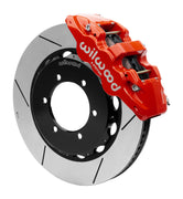 Wilwood red AERO6-DS caliper over an assembled 14.25-inch slotted rotor and separate hat for the Patrol Y61 front installation