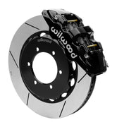 Wilwood black AERO6-DS caliper over an assembled 14.25-inch slotted rotor and separate hat for the Patrol Y61 front installation