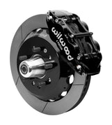 Wilwood black six-piston front caliper beside a 12.88-inch slotted rotor, separate hat and projecting hub for the CPP Tri-Five 12.88-inch front installation