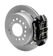 Wilwood black low-profile Dynapro rear caliper beside an assembled 11-inch plain-face parking-hat rotor for the new-style Big Ford 2.50-inch-offset rear interface