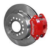 Wilwood red D154 rear caliper beside an assembled 12.19-inch plain-face parking-hat rotor for the GM 12-bolt forward-caliper rear interface