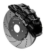 Wilwood black SX6R caliper over an assembled 14-inch drilled-and-slotted dynamic lug-drive disc and hat for the Corvette C7 front arrangement