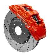 Wilwood red SX6R caliper over an assembled 14-inch drilled-and-slotted dynamic lug-drive disc and hat for the Corvette C7 front arrangement