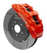 Wilwood SX6R front brake kit, Corvette C7, 15-inch GT rotors: Assembled brake view with red SX6R caliper over a gt slotted rotor and black central hat; no projecting replacement wheel hub is shown.