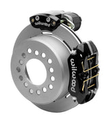 Wilwood Dynapro LP rear brake kit, Big Ford new-style 2.50-inch offset, 11-inch plain rotors: Assembled rotor view with a black hydraulic service caliper on the side and a separate black electronic parking caliper above it.