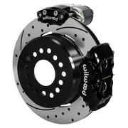 Wilwood Dynalite rear brake kit, Big Ford new-style 2.50-inch offset, 12.19-inch SRP rotors: Assembled rotor view with a black hydraulic service caliper on the side and a separate black electronic parking caliper above it.