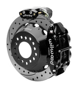 Wilwood Superlite 4R rear brake kit, Big Ford new-style 2.50-inch offset, 12.88-inch SRP rotors: Assembled rotor view with a black hydraulic service caliper on the side and a separate black electronic parking caliper above it.