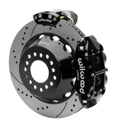 Wilwood Superlite 4R rear brake kit, Big Ford new-style 2.50-inch offset, 14-inch SRP rotors: Assembled rotor view with a black hydraulic service caliper on the side and a separate black electronic parking caliper above it.