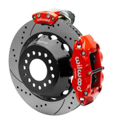 Wilwood Superlite 4R rear brake kit, Big Ford new-style 2.50-inch offset, 14-inch SRP rotors: Assembled rotor view with a red hydraulic service caliper on the side and a separate red electronic parking caliper above it.