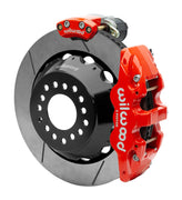 Wilwood AERO4 rear brake kit, Big Ford new-style 2.50-inch offset, 14-inch GT rotors: Assembled rotor view with a red hydraulic service caliper on the side and a separate red electronic parking caliper above it.