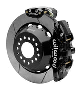 Wilwood AERO4 rear brake kit, Big Ford new-style 2.50-inch offset, 14-inch GT rotors: Assembled rotor view with a black hydraulic service caliper on the side and a separate black electronic parking caliper above it.