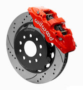 Wilwood AERO6-DS front brake kit, Wrangler JL / Gladiator, 14-inch SRP rotors: Assembled brake view with red AERO6-DS caliper over a drilled & slotted rotor and black central hat; no projecting replacement wheel hub is shown.