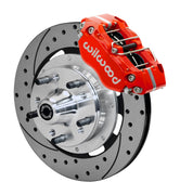 Wilwood Dynapro Radial front brake kit, GM AFX ProSpindles, 11.75-inch SRP rotors: Assembled brake view with red Dynapro Radial caliper, drilled & slotted rotor, silver hat/adapter and projecting hub with wheel studs.
