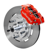 Wilwood Dynapro Radial front brake kit, GM AFX ProSpindles, 11.75-inch plain rotors: Assembled brake view with red Dynapro Radial caliper, plain face rotor, silver hat/adapter and projecting hub with wheel studs.