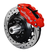 Wilwood Superlite 6R front brake kit, GM AFX ProSpindles, 12.88-inch SRP rotors: Assembled brake view with red Superlite 6R caliper, drilled & slotted rotor, black hat/adapter and projecting hub with wheel studs.