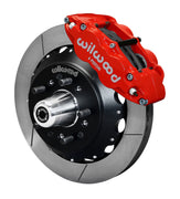 Wilwood Superlite 6R front brake kit, GM AFX ProSpindles, 12.88-inch GT rotors: Assembled brake view with red Superlite 6R caliper, gt slotted rotor, black hat/adapter and projecting hub with wheel studs.