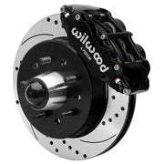 Wilwood Superlite 6R front brake kit, five-lug GM truck/SUV iron ProSpindles, 12.19-inch SRP rotors: Assembled brake view with black Superlite 6R caliper, drilled & slotted rotor, black hat/adapter and projecting hub with wheel studs.