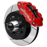 Wilwood Superlite 6R front brake kit, five-lug GM truck/SUV iron ProSpindles, 12.19-inch GT rotors: Assembled brake view with red Superlite 6R caliper, gt slotted rotor, black hat/adapter and projecting hub with wheel studs.