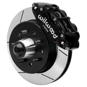 Wilwood Superlite 6R front brake kit, five-lug GM truck/SUV iron ProSpindles, 12.19-inch GT rotors: Assembled brake view with black Superlite 6R caliper, gt slotted rotor, black hat/adapter and projecting hub with wheel studs.