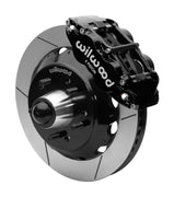 Wilwood Superlite 6R front brake kit, five-lug GM truck/SUV iron ProSpindles, 13.06-inch GT rotors: Assembled brake view with black Superlite 6R caliper, gt slotted rotor, black hat/adapter and projecting hub with wheel studs.